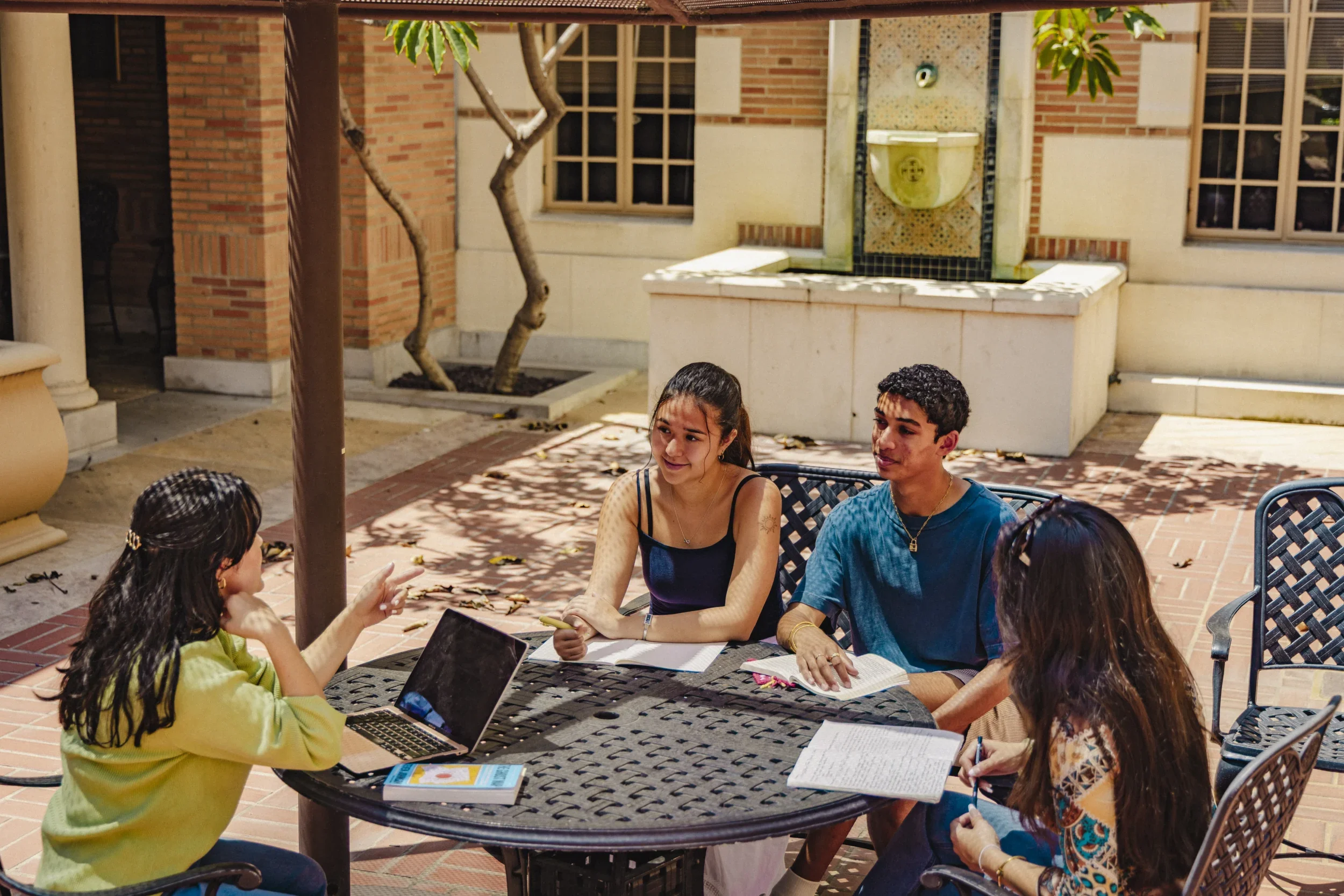 Students chatting outdoors.